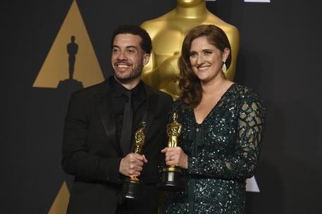 Ezra Edelman,Caroline Waterlow © AP