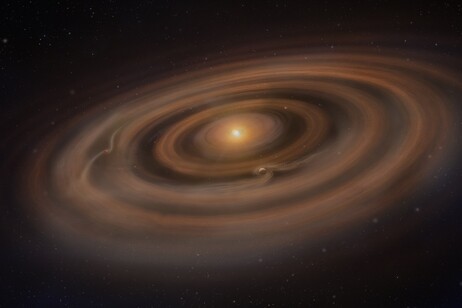 Rappresentazione artistica della formazione di pianeti attorno a una stella (fonte: NSF/AUI/NSF NRAO/S.Dagnello)