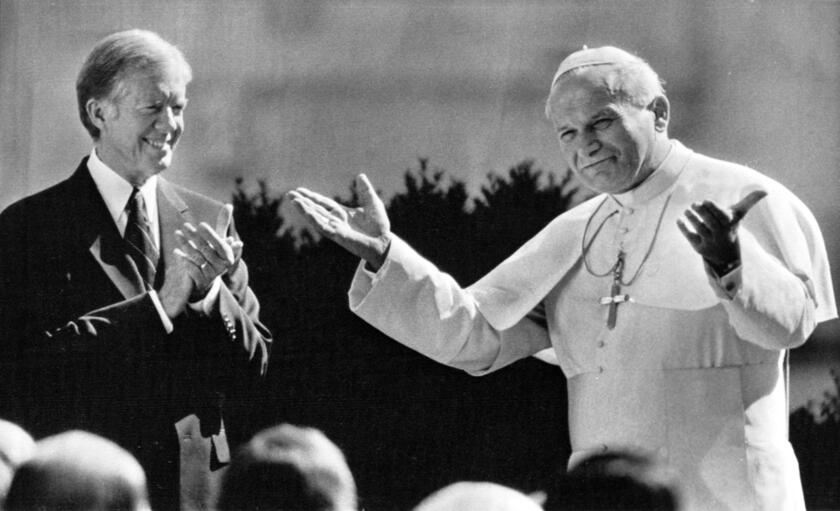 Jimmy Carter greets Pope John Paul II