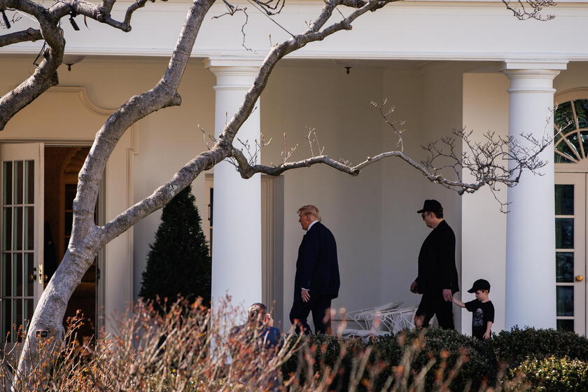 US President Trump views Tesla vehilces in front of the White House